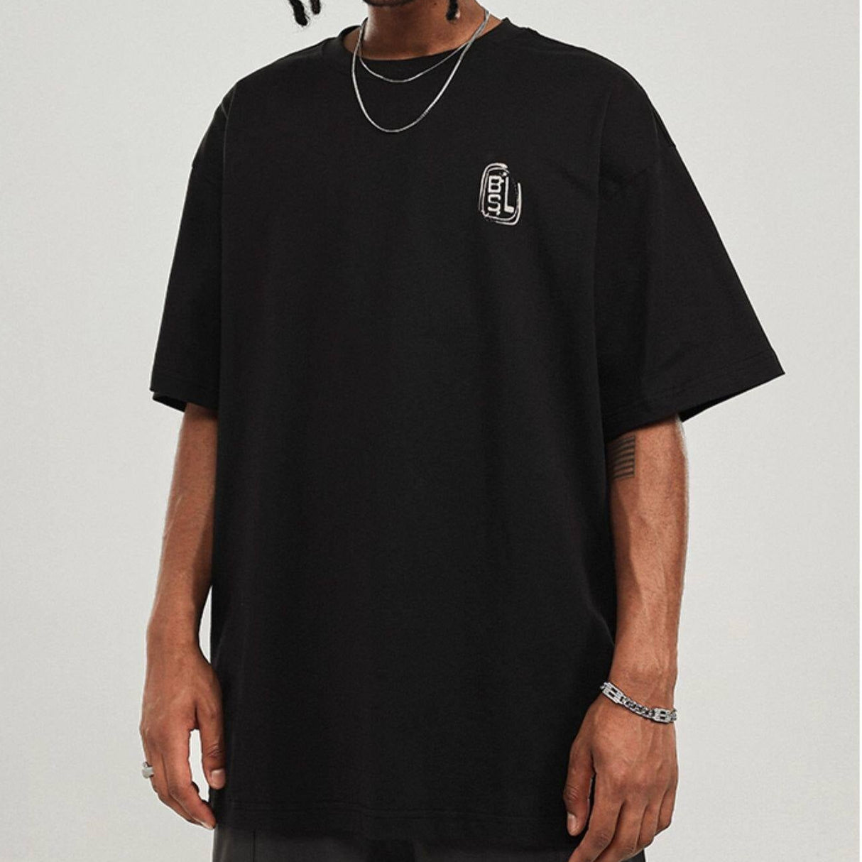Black Boneless logo print T-shirt featuring a minimalist design and casual fit, made by BONELESS.