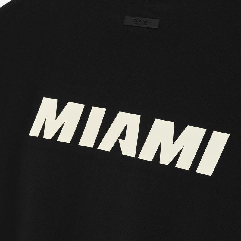 Fear of God Essentials X HEAT NBA 90s heavyweight black T-shirt, casual apparel with bold logo design and comfortable fit.