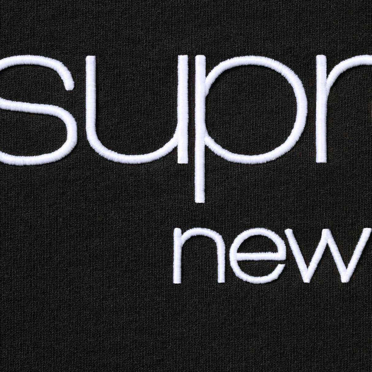 Black Supreme Classic Logo Hoodie with front pocket and bold logo on chest, made from cozy sweatshirt material.