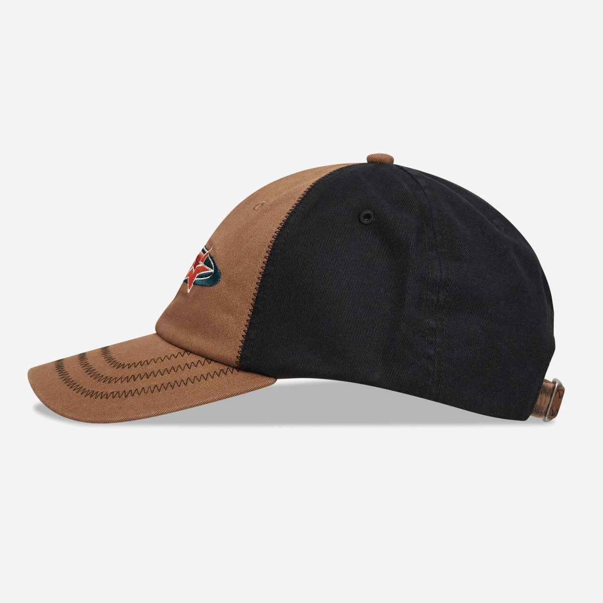 Brown Stussy Oval Star Cap, stylish headwear with oval star logo, featuring adjustable strap and classic design.