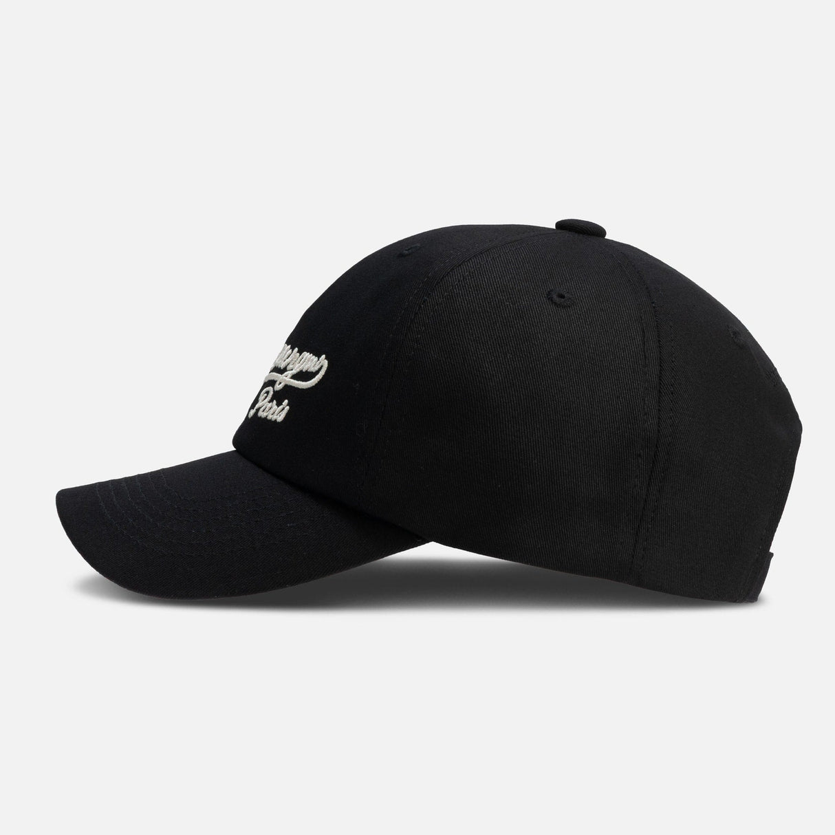 Black Wooyoungmi script logo cap, a stylish headwear piece with embroidered branding and adjustable strap.