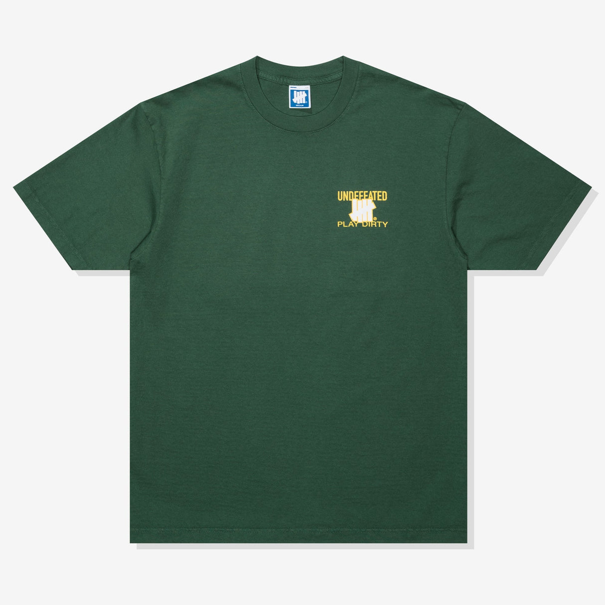 Forest green Undefeated Trademark Tee featuring the brand's logo on the front, casual short-sleeve t-shirt for streetwear style.