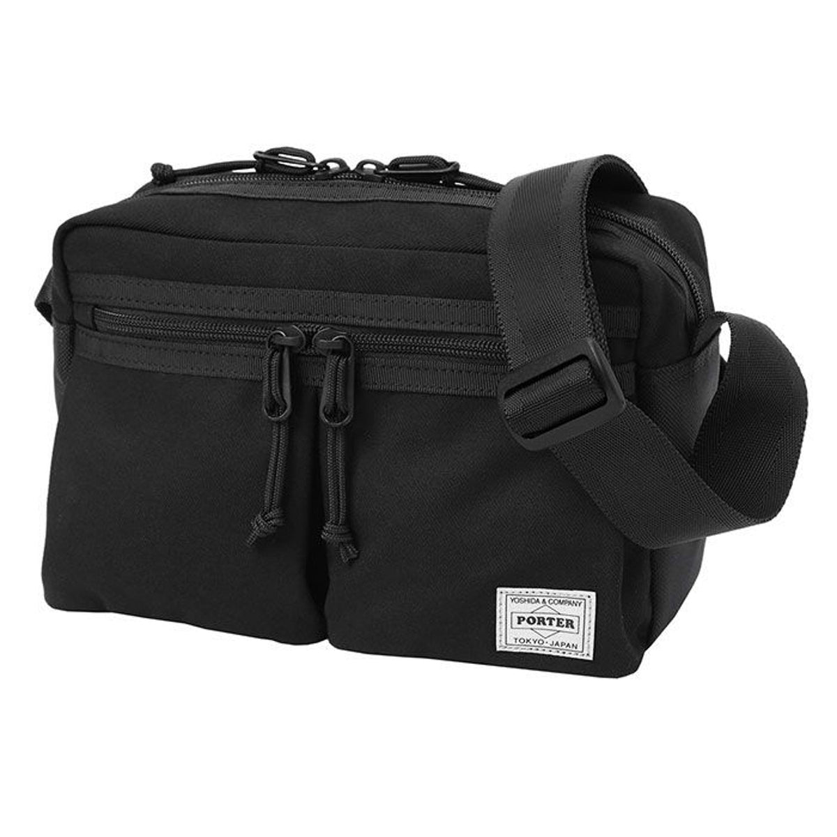 Porter Yoshida Japan Switch shoulder bag with adjustable strap, made of durable fabric in dark color, featuring multiple compartments.