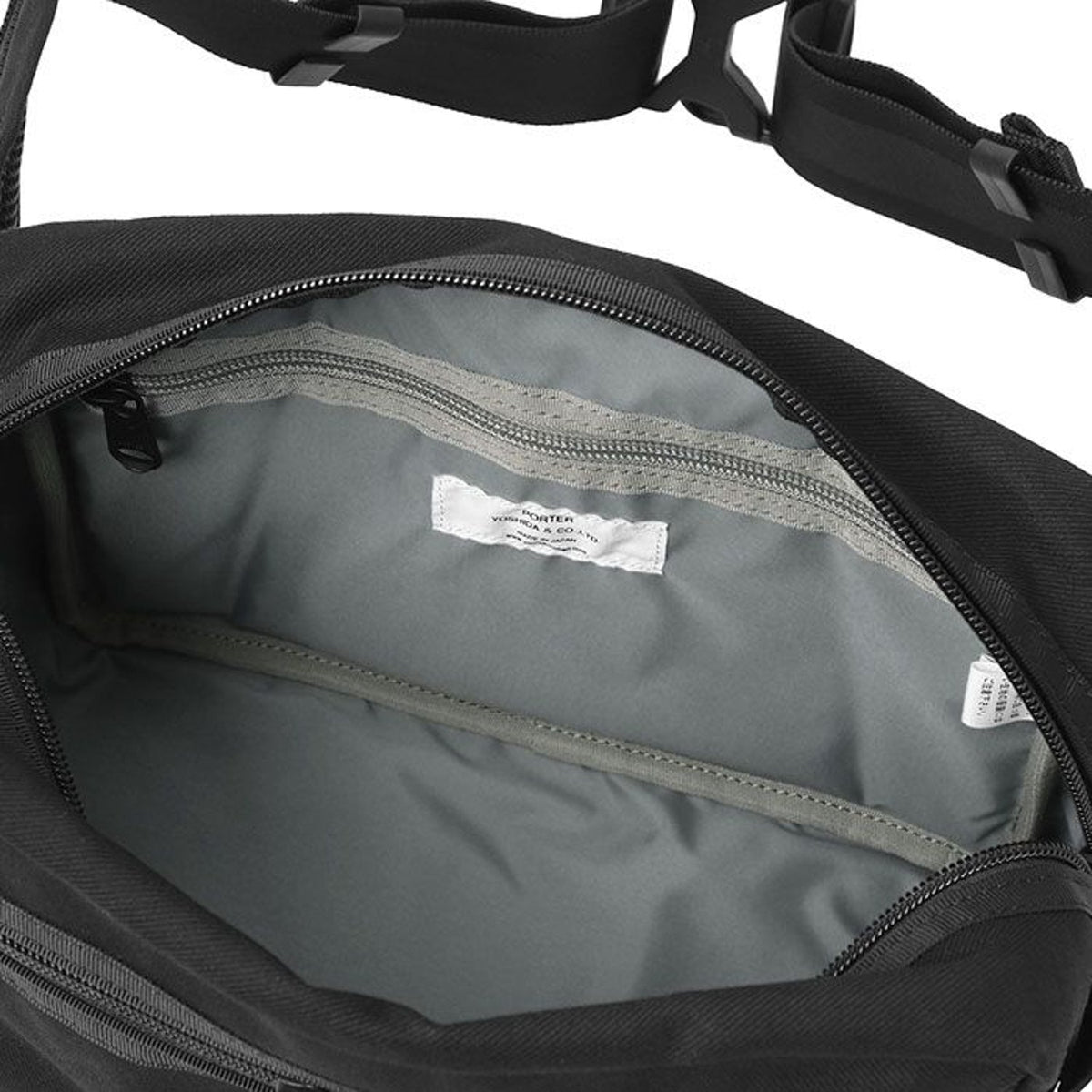 Porter Yoshida Japan Switch waist bag in black with adjustable strap and multiple compartments, stylish and functional bag for everyday use.