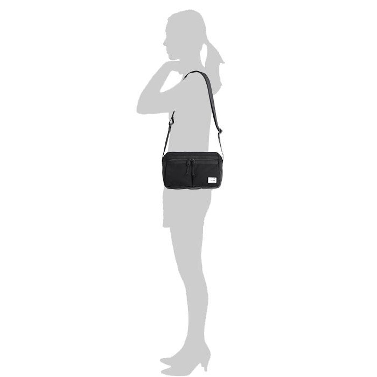 Porter Yoshida Japan Switch shoulder bag with black canvas and leather accents, featuring adjustable strap and multiple compartments.