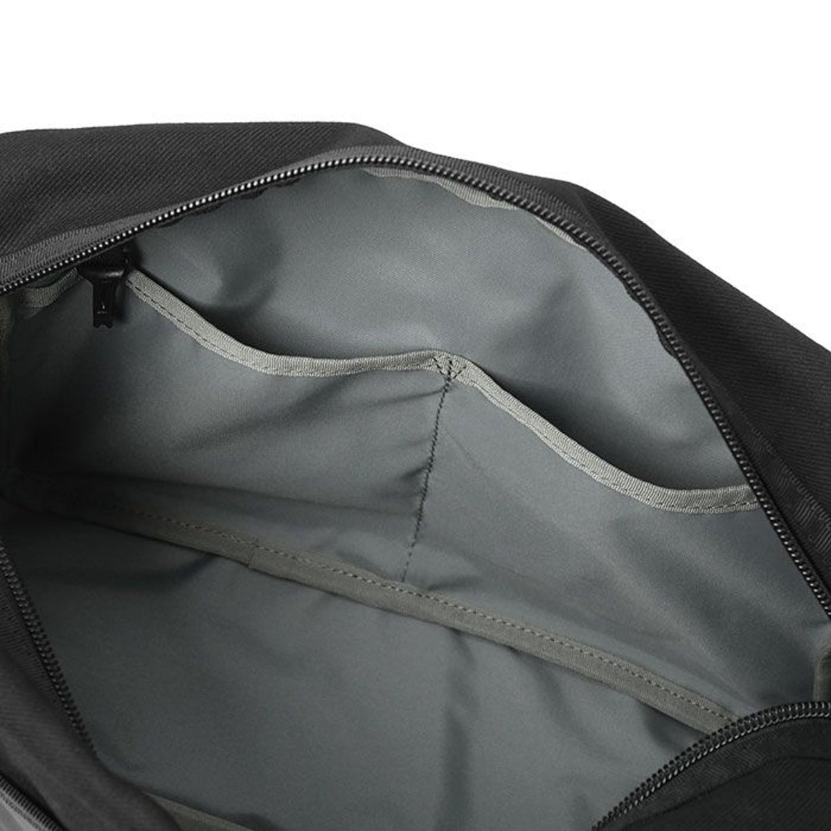 Porter Yoshida Japan Switch large shoulder bag with adjustable strap, durable fabric, and minimalist design in neutral color.