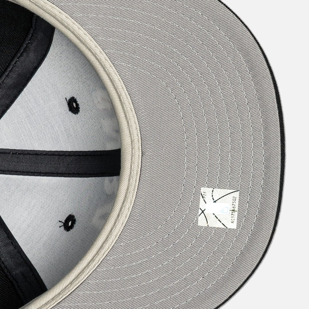 Fear of God Essentials NBA New Era 9FIFTY cap, front view with adjustable strap, black and red design, sports headwear.