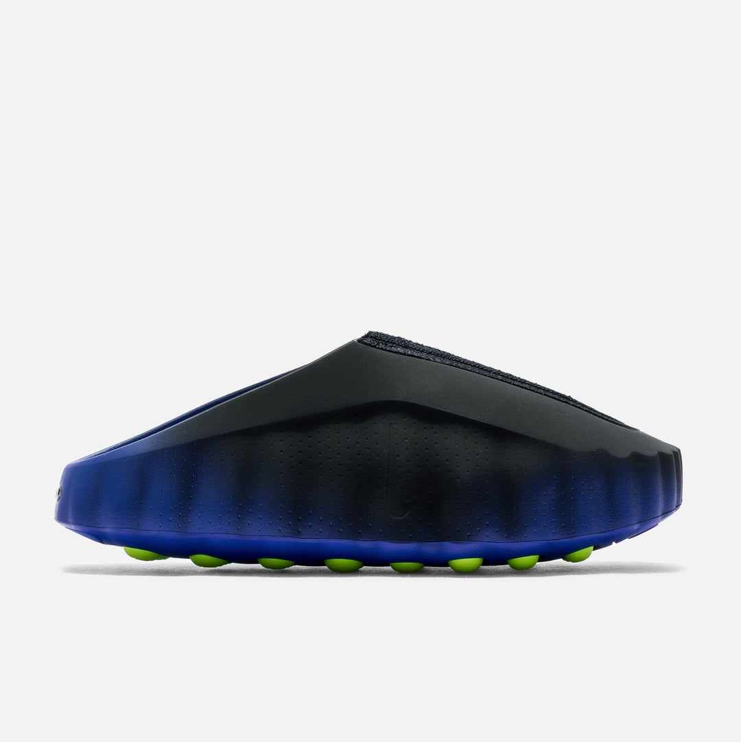 Nike Mind 001 Flyknit slides featuring a hyper-royal, volt, and black colorway with breathable Flyknit material.