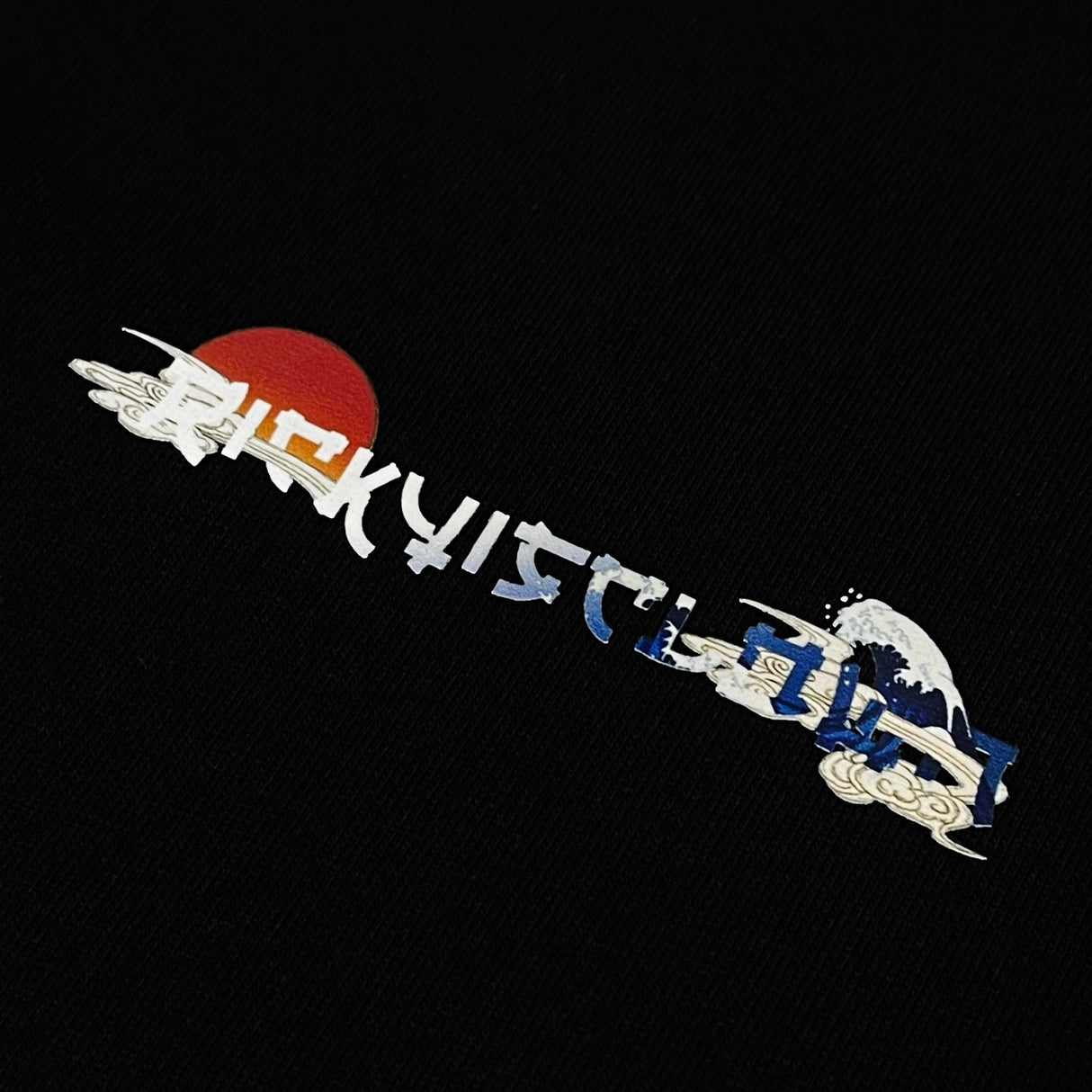 Black Rickyisclown Japan Kanagawa Wave Tee featuring a vibrant wave design on soft cotton fabric.