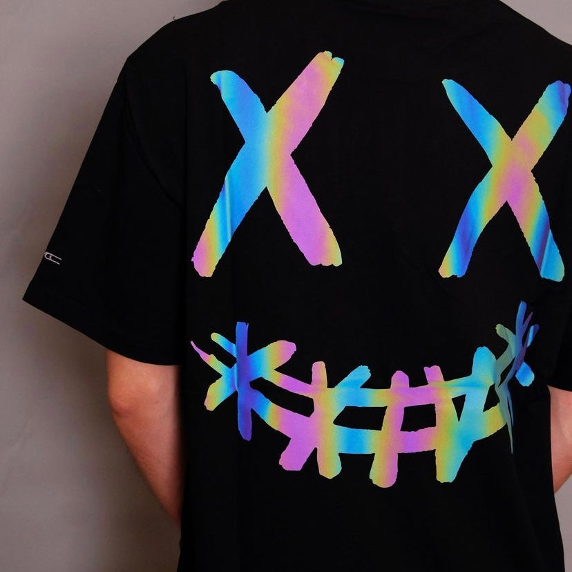 Black Rickyisclown Basic Reflective Smiley Tee featuring a reflective smiley face graphic on the front.