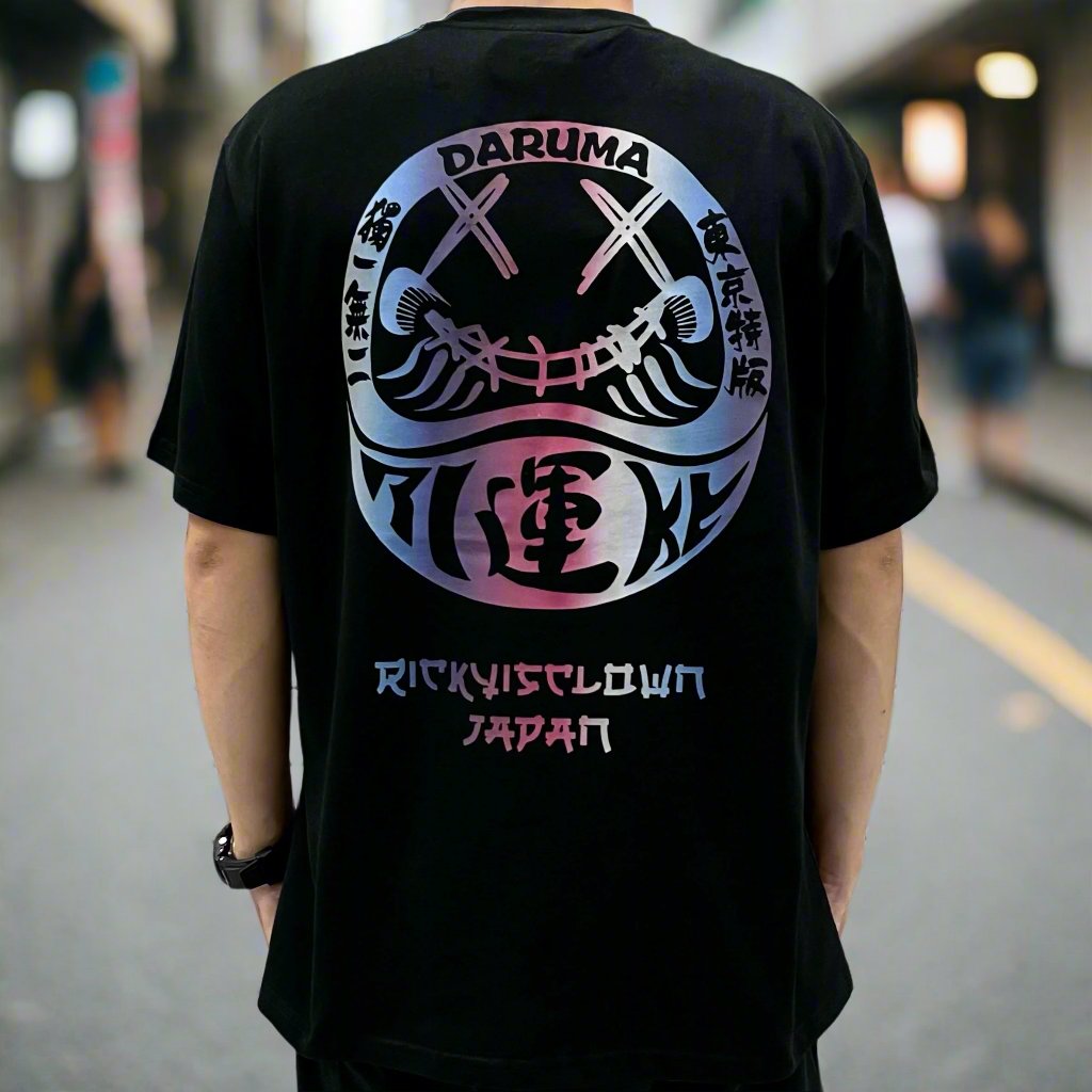Black Rickyisclown Japan Lucky Daruma laser-reflective tee shirt with bold design, made by RICKYISCLOWN.