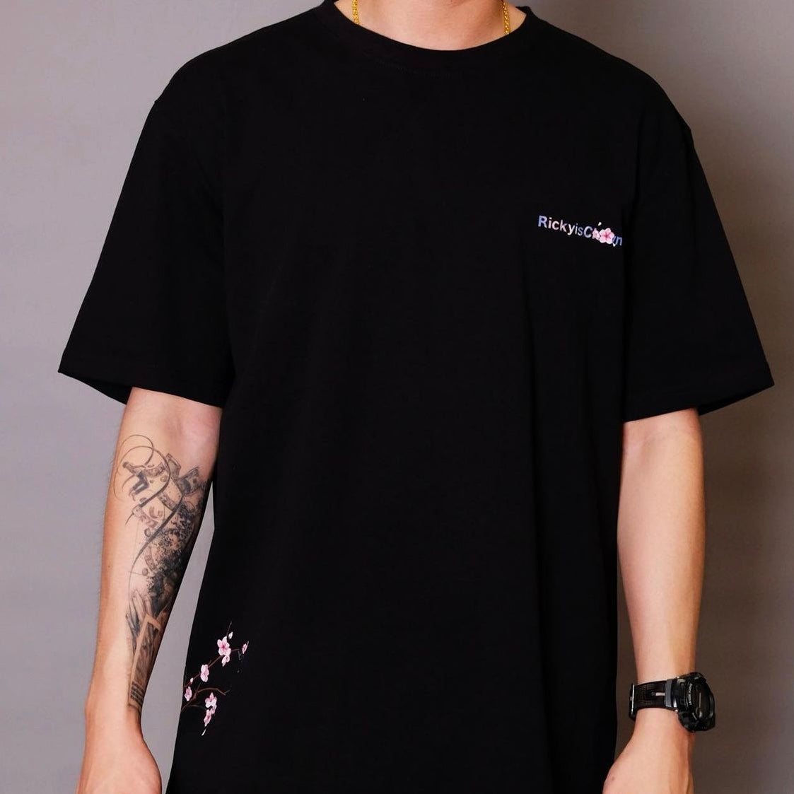 RICKYISCLOWN Mount Fuji Sakura black T-shirt featuring Mount Fuji and cherry blossom design, casual apparel for men and women.