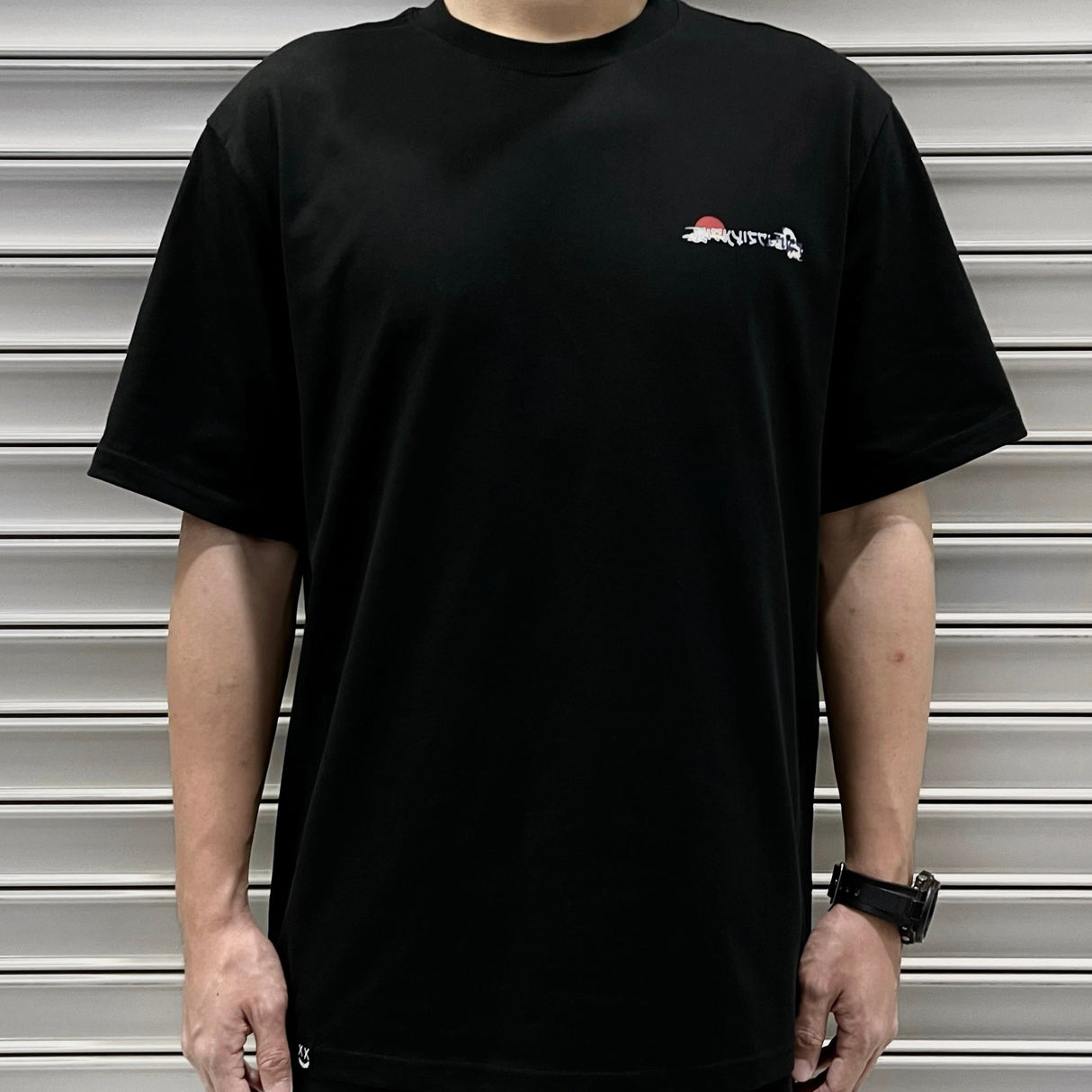 Black Rickyisclown Japan Kanagawa Wave T-shirt featuring bold wave artwork, casual fit, and branded logo.