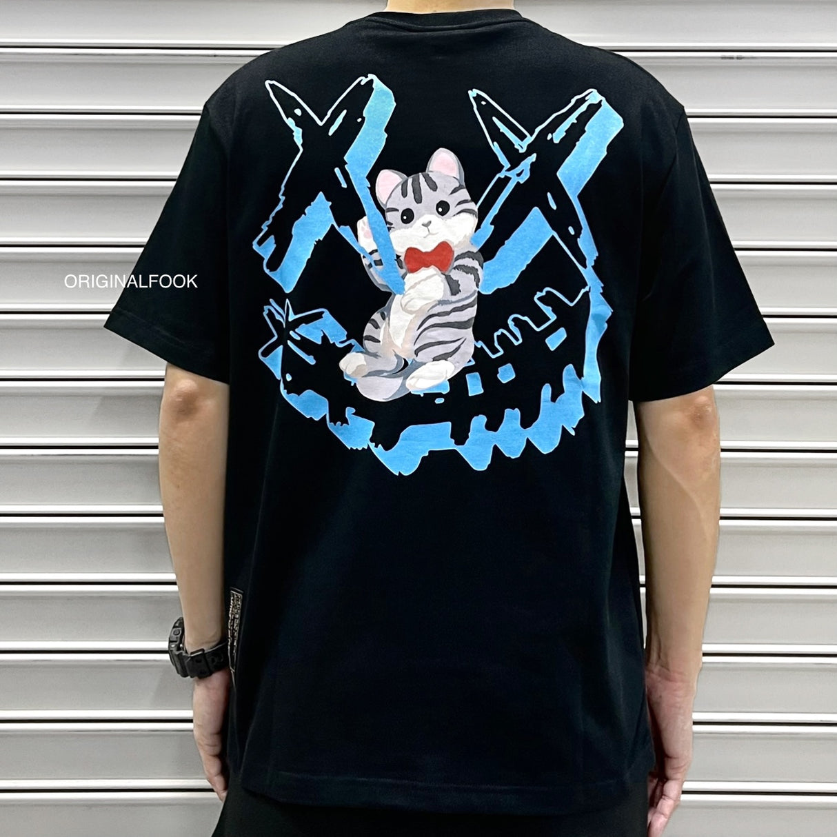 Black Rickyisclown Hanging Cat Smiley Tee shirt with playful graphic design, casual fit, by RICKYISCLOWN.