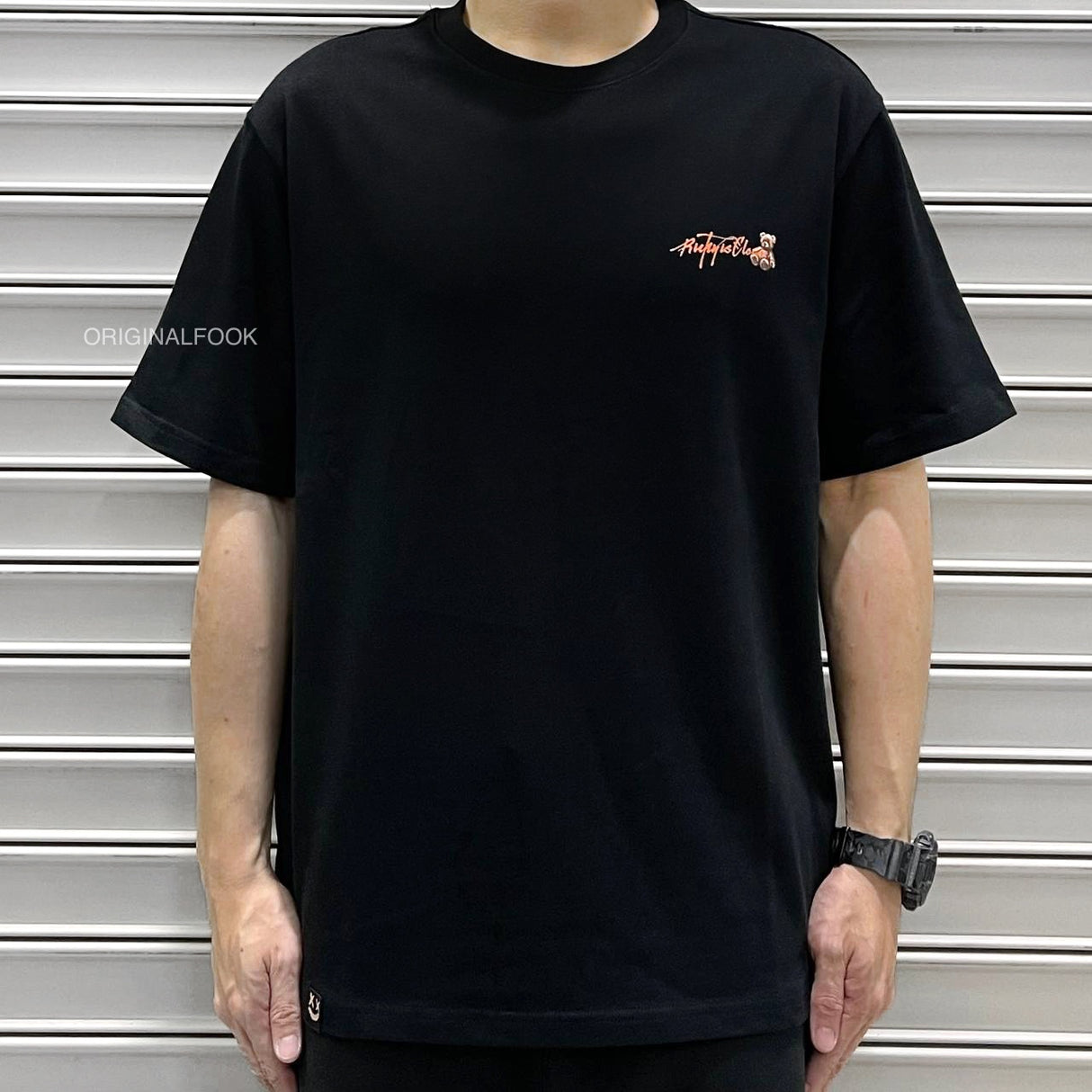 Black Rickyisclown Hanging Bear Smiley T-shirt with graphic print, casual apparel from Rickyisclown brand.