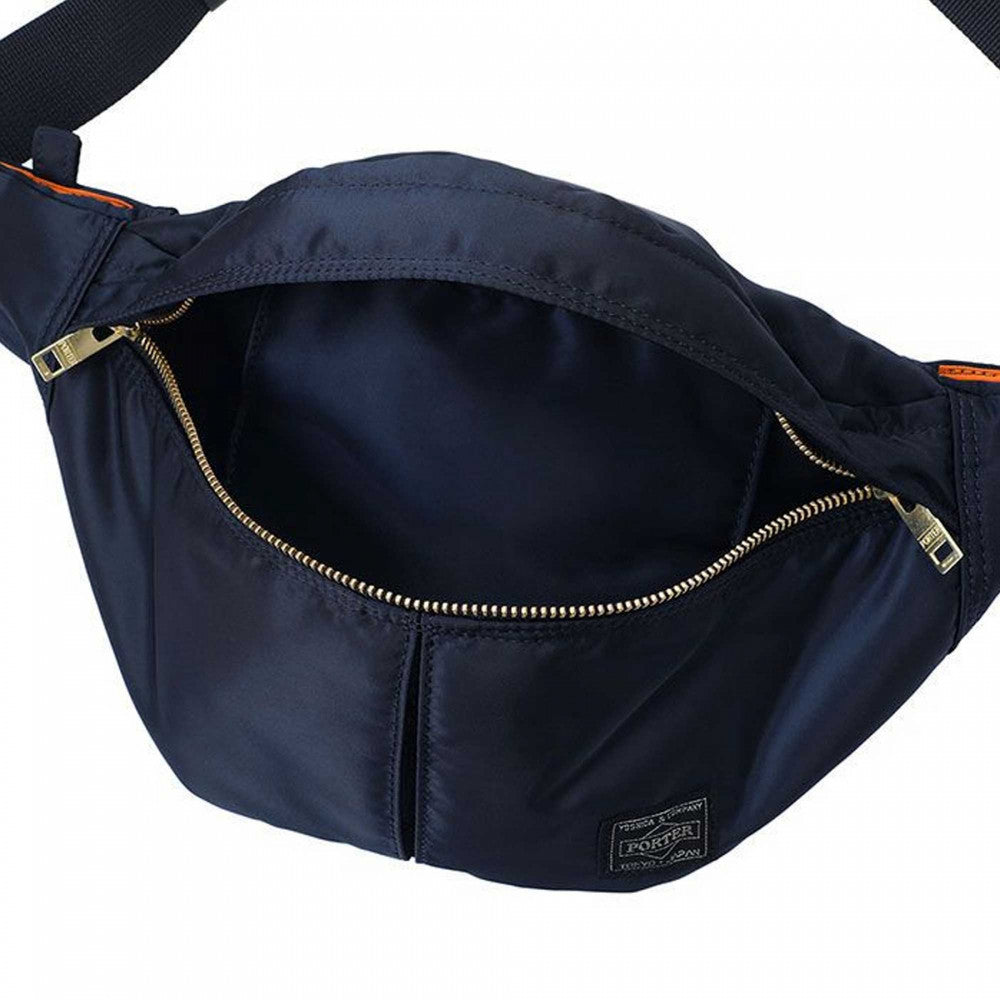 Porter Yoshida Japan waist bag in iron blue, casual design with adjustable strap and multiple compartments for storage.