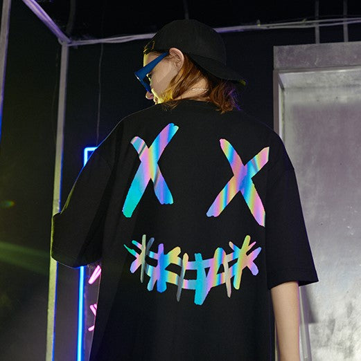 RICKYISCLOWN black reflective Smiley Tee with holographic smiley graphic, casual apparel, front view with reflective details