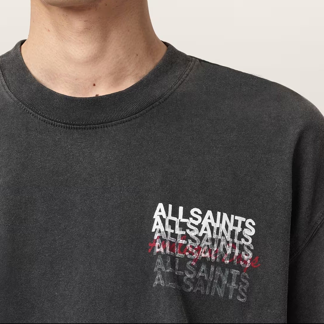 Allsaints Graphene Logo T-shirt in washed black showcasing a minimalist design and the brand’s logo on the front.