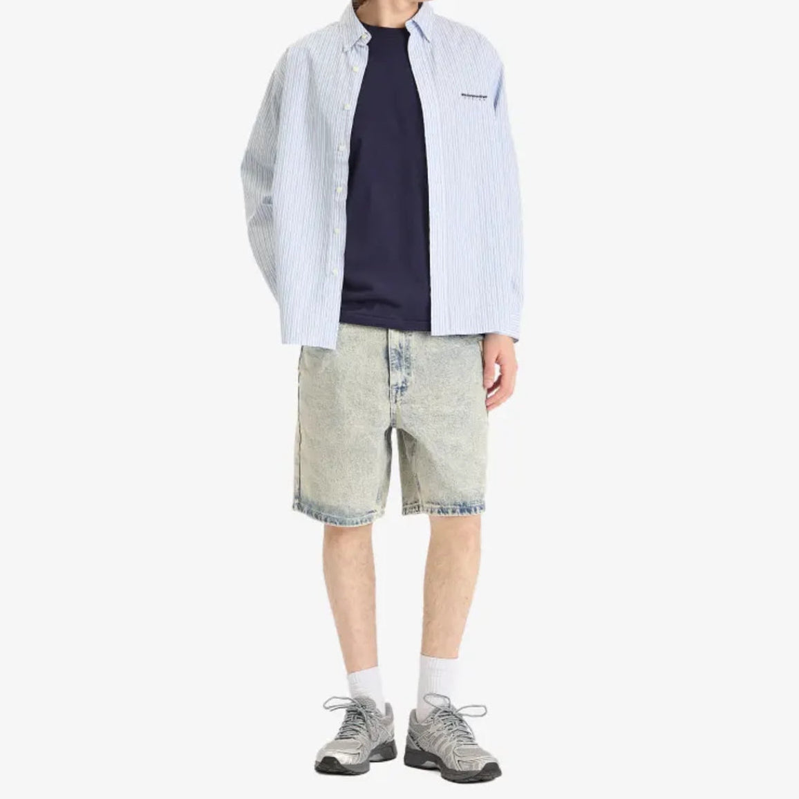 AAPE By Bathing Ape loose fit denim shorts with distressed details and brand logo patch on the back, casual men's apparel.
