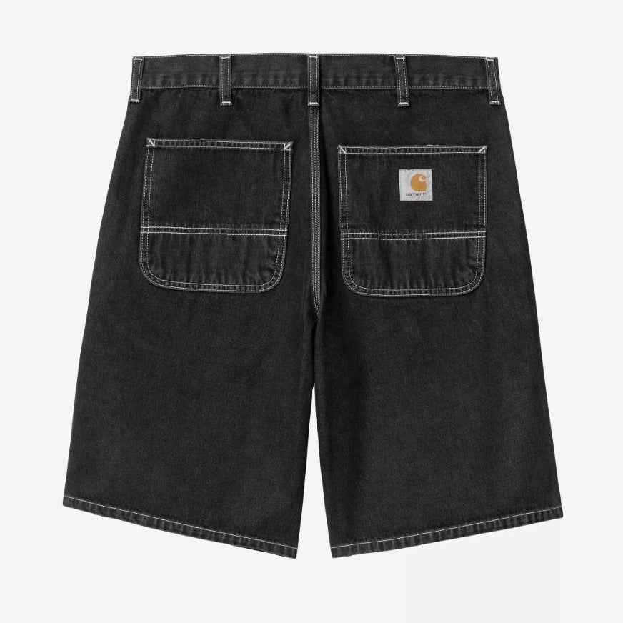 Black Carhartt WIP denim shorts with a heavy stone wash finish, casual apparel for men, shown in a square image.