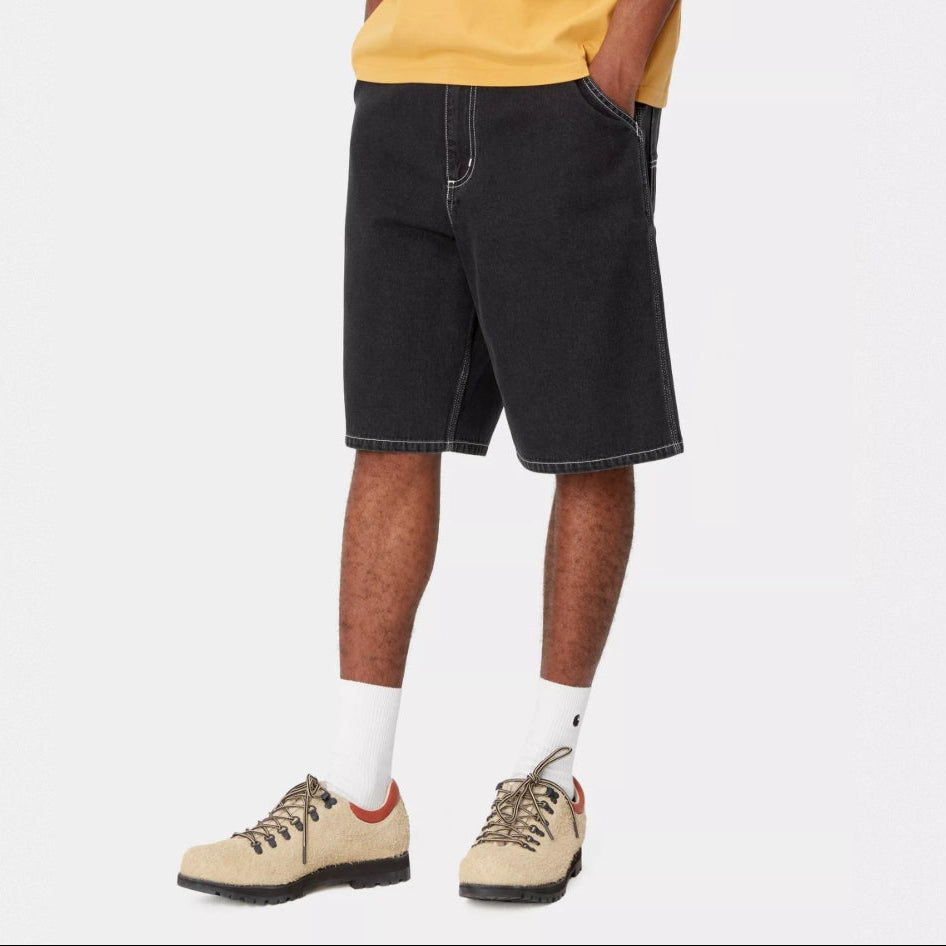 Black Carhartt WIP denim shorts with a heavy stone wash look, casual and stylish apparel for everyday wear.