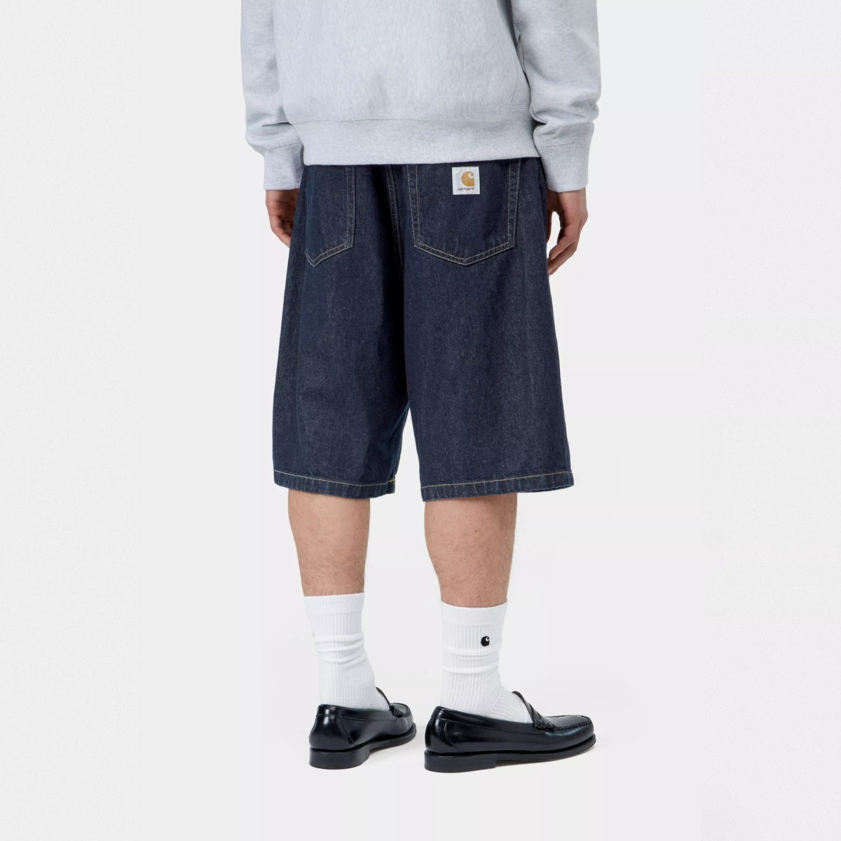Blue Carhartt WIP Landon Loose Denim Shorts with a rinsed finish, casual fit, and classic denim texture.