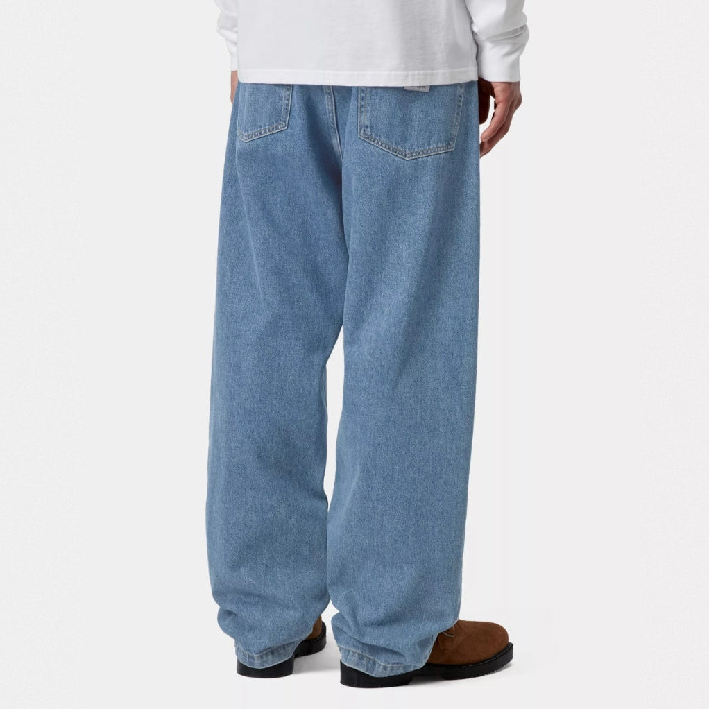 Carhartt WIP Landon Jeans in blue with a heavy stone wash, shown from the front