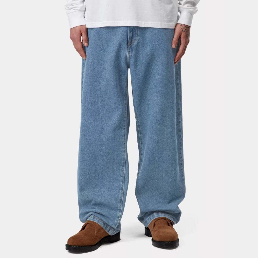 Carhartt WIP Landon jeans in blue heavy stone wash, showing classic straight-leg denim styling