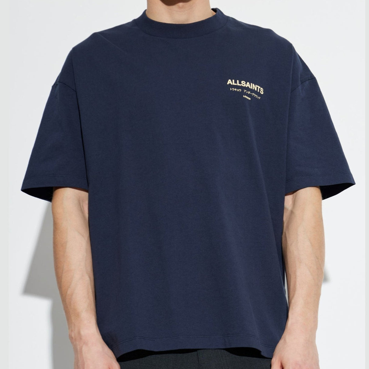 AllSaints Underground Logo Tee in MoonLit Blue, casual short-sleeve T-shirt with logo print, displayed on a flat surface.