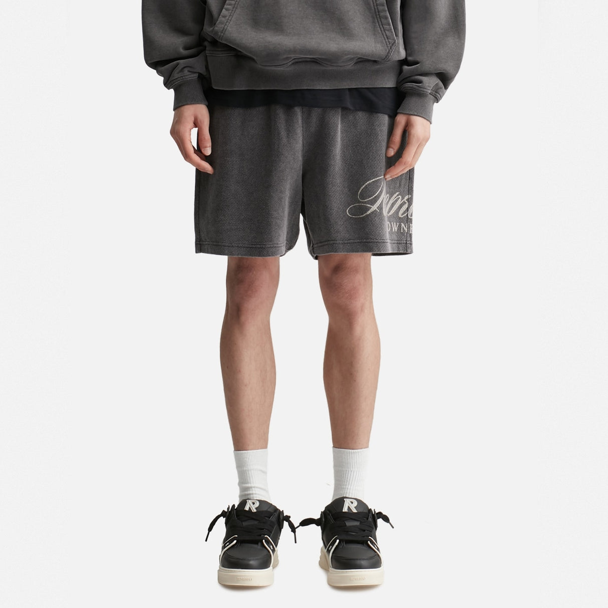 Represent Script Sweat Shorts in vintage black, featuring a relaxed fit and stylish script logo on soft cotton fabric.