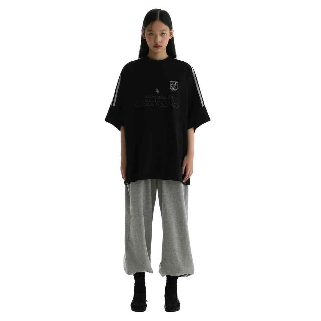 Black MasonPrince Millennium OV Raglan Tee featuring contrasting sleeves and a classic fit, casual apparel by MasonPrince.