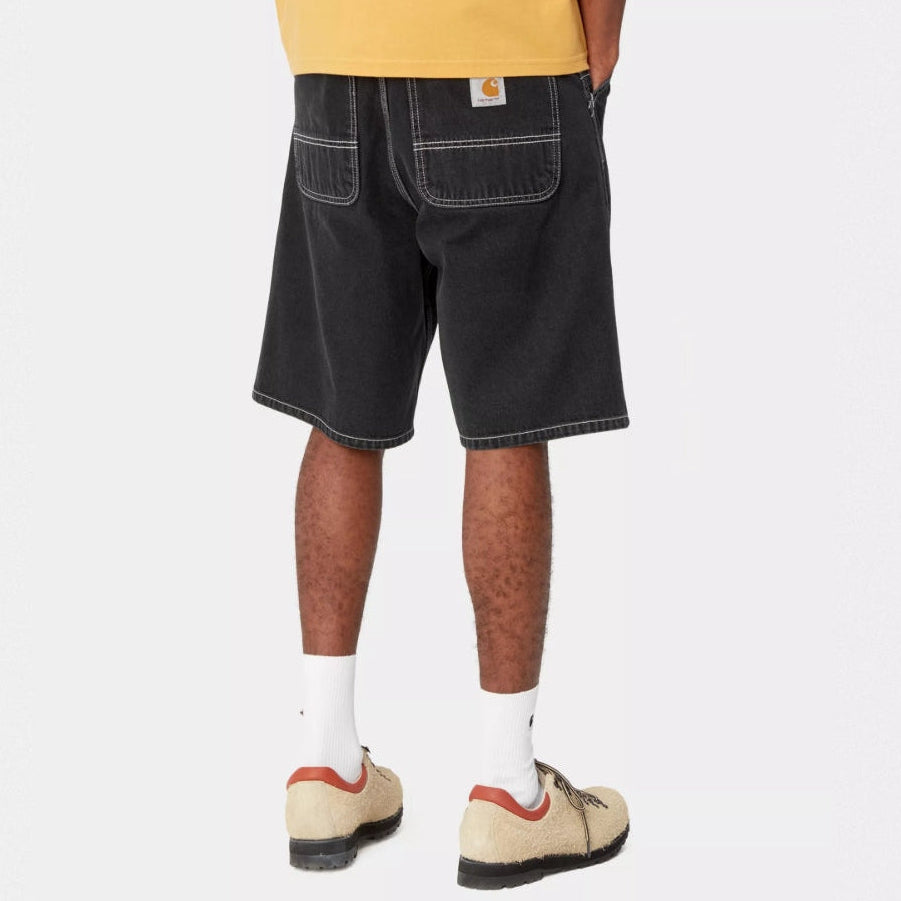 Black Carhartt WIP denim shorts with a heavy stone wash, casual style, and classic fit, perfect for everyday wear.
