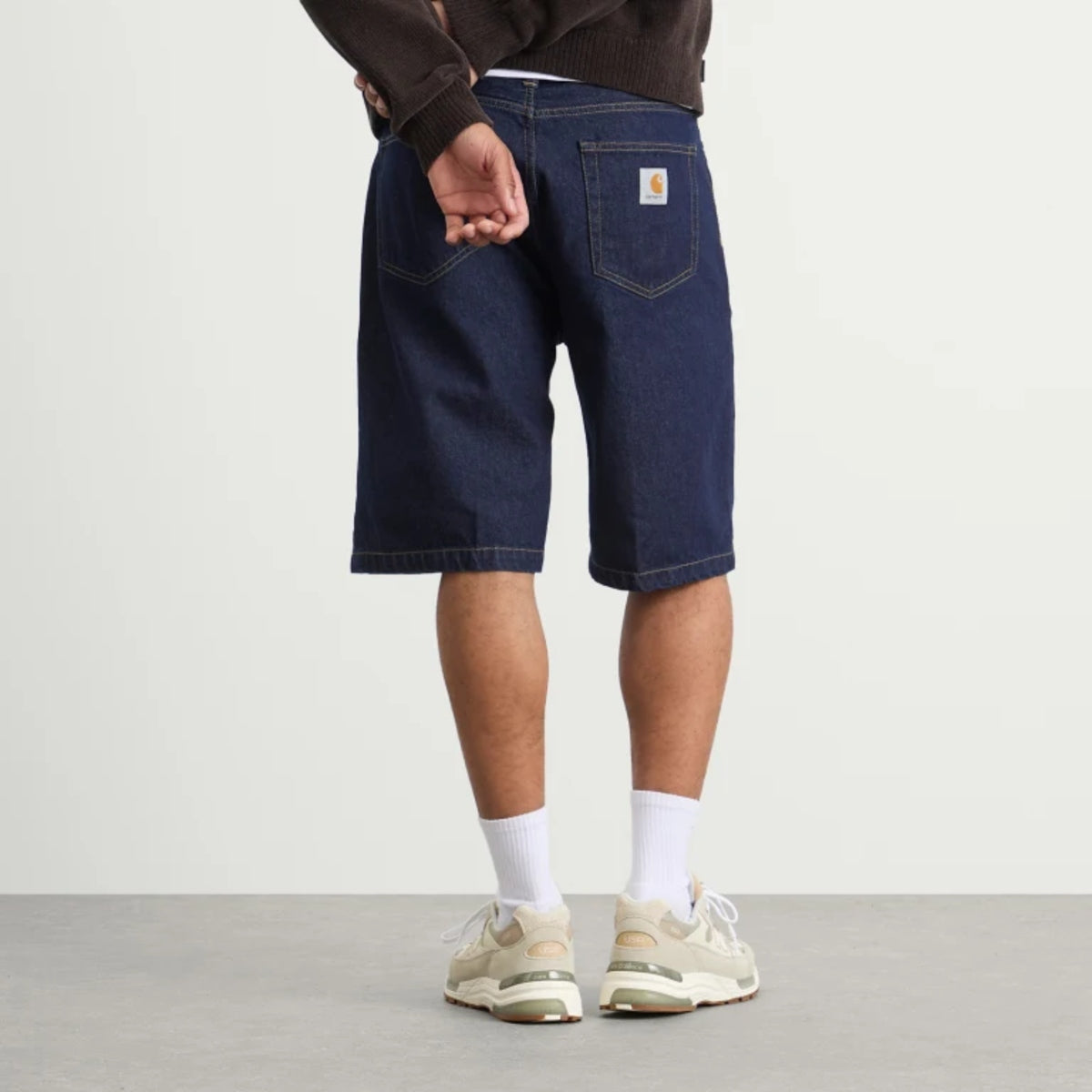 Carhartt WIP Landon loose-fit denim shorts in blue rinsed, casual men's apparel with a relaxed fit and classic denim style.