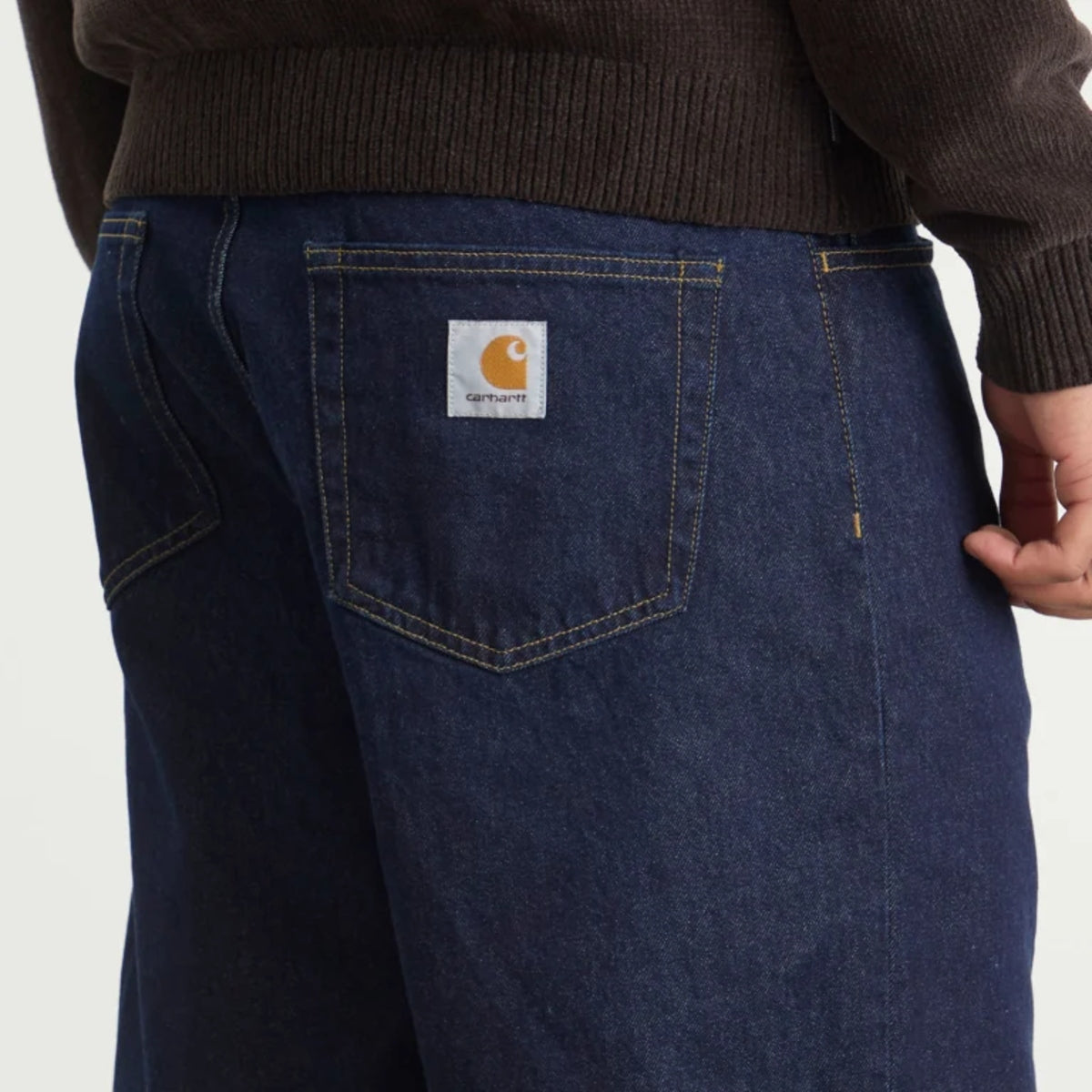 Carhartt WIP Landon loose fit denim shorts in blue rinsed color, casual apparel with distressed detailing and belt loops.