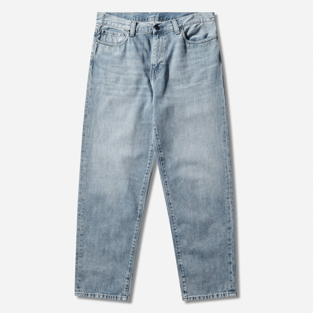 Blue Carhartt WIP Aaron Pants with a burst washed finish, casual fit, and durable cotton fabric, suitable for everyday wear.