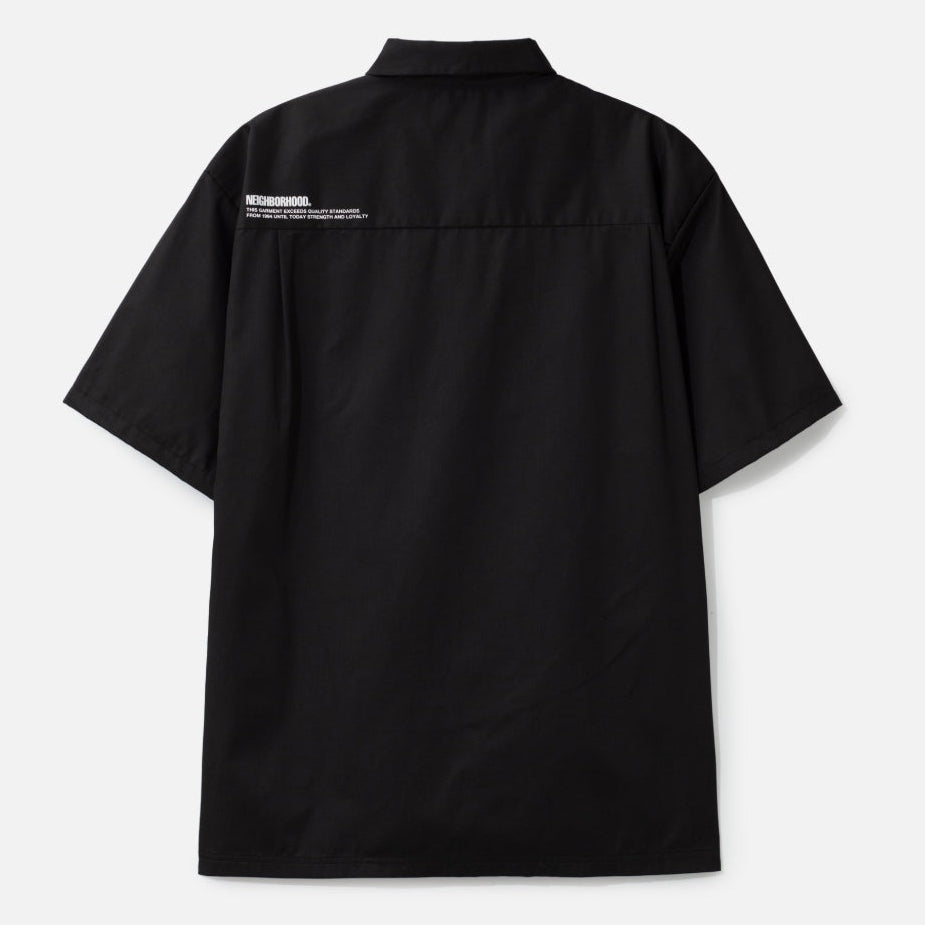 Black NEIGHBORHOOD Classic Work Short Sleeve Shirt displayed on a hanger, showcasing its casual design and fabric details.