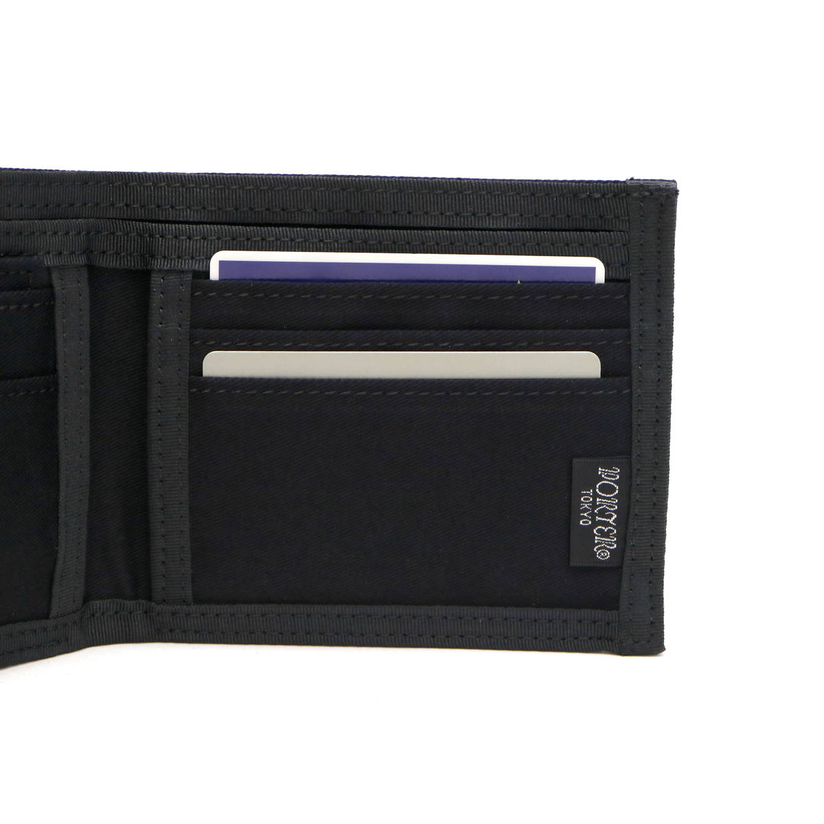 Black Porter Yoshida Japan Drawing Wallet made of durable bags material, featuring a sleek design and compact size.