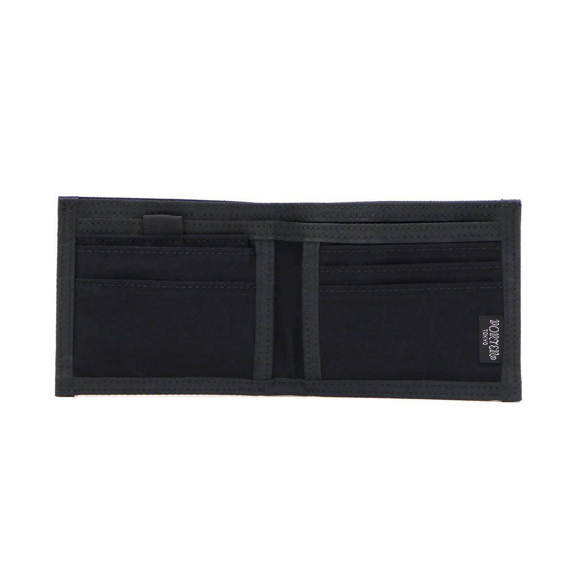 Black Porter Yoshida Japan Drawing Wallet made of durable fabric, featuring multiple compartments and the brand's signature design.