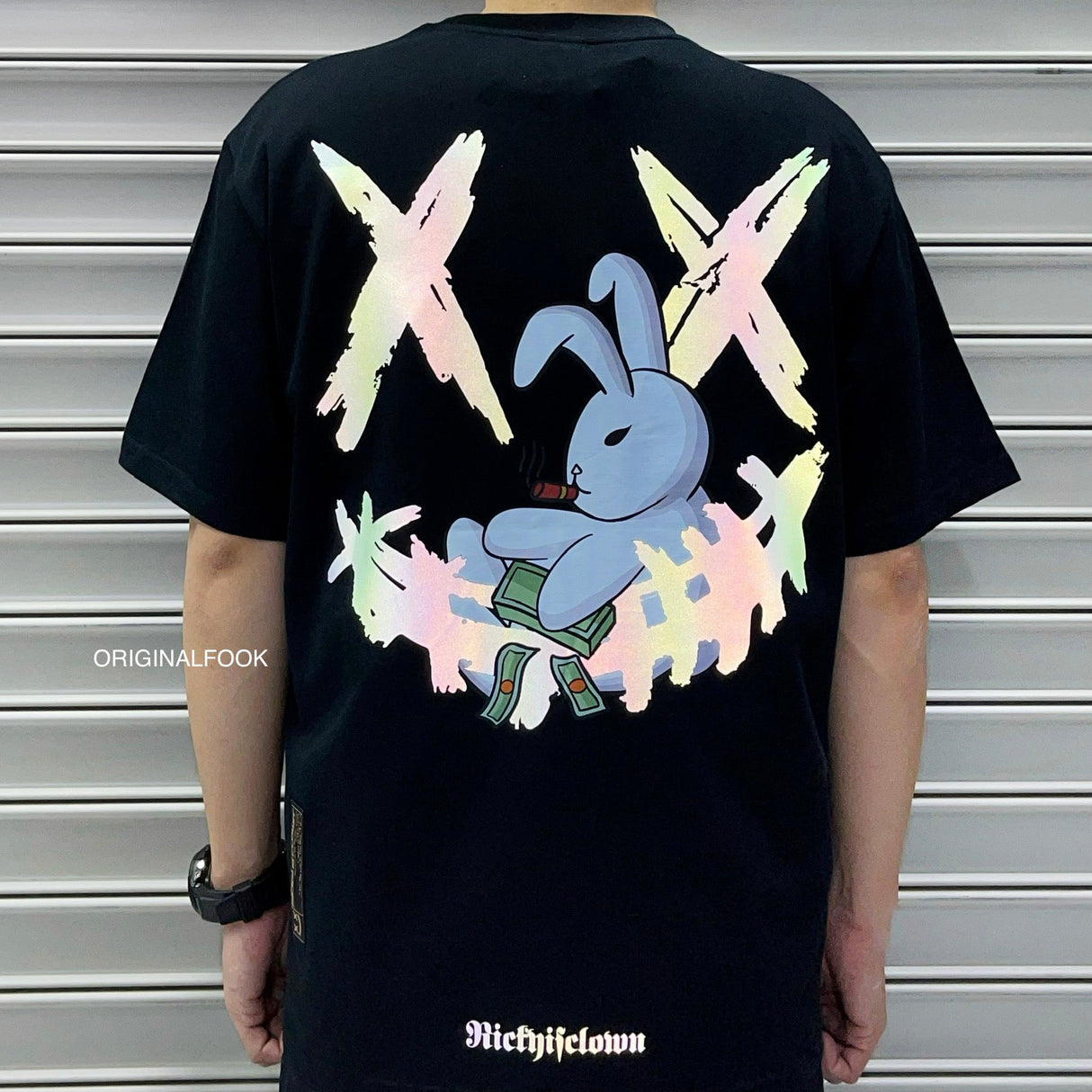 RICKYISCLOWN Boss Bunny Laser Reflective Black Tee, casual black t-shirt with reflective bunny graphic, front view.