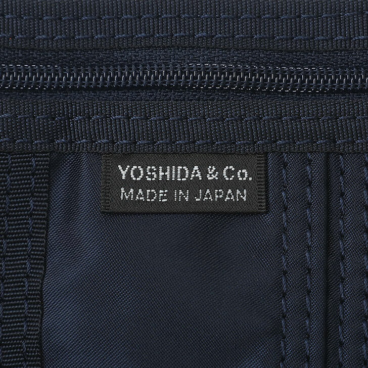 Porter Japan Tanker Two-Fold Wallet in Iron Blue with multiple card slots and fold-over design, made of durable accessories material.