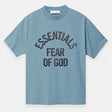Fear of God Essentials Campus 90s heavyweight tee in faded coastal color, showcasing the relaxed fit and soft cotton fabric.