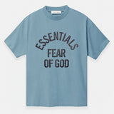 Fear of God Essentials Campus 90s heavyweight tee in faded coastal color, showcasing the relaxed fit and soft cotton fabric.