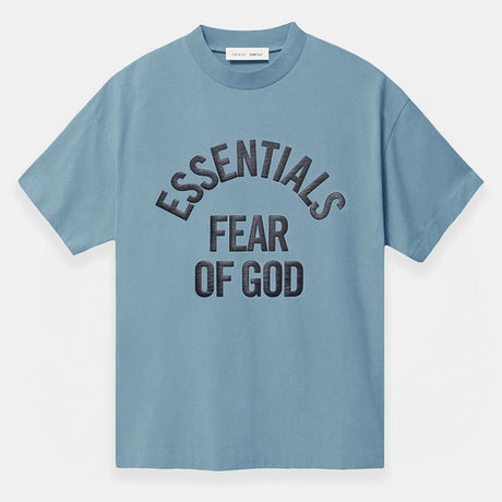 Fear of God Essentials Campus 90s heavyweight tee in faded coastal color, showcasing the relaxed fit and soft cotton fabric.