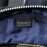 Porter Yoshida Japan Counter Shade large waist bag in camouflage with adjustable strap and multiple compartments.