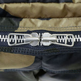Porter Yoshida Japan Counter Shade large waist bag in camouflage fabric, stylish and functional outdoor accessory.