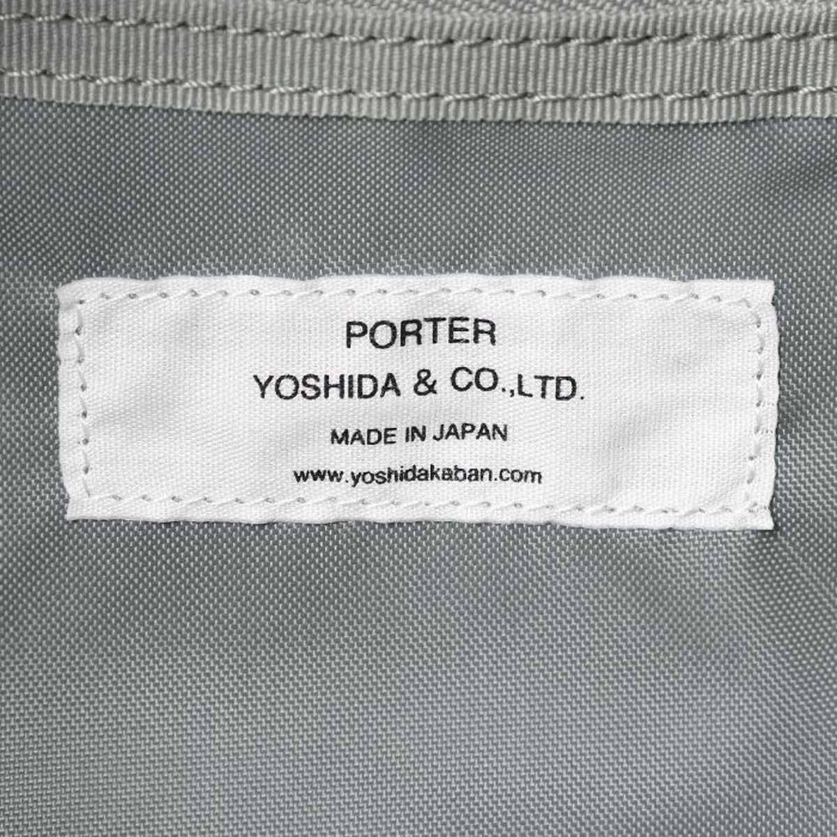 Porter Yoshida Japan Switch large shoulder bag in durable fabric with adjustable strap and multiple compartments.