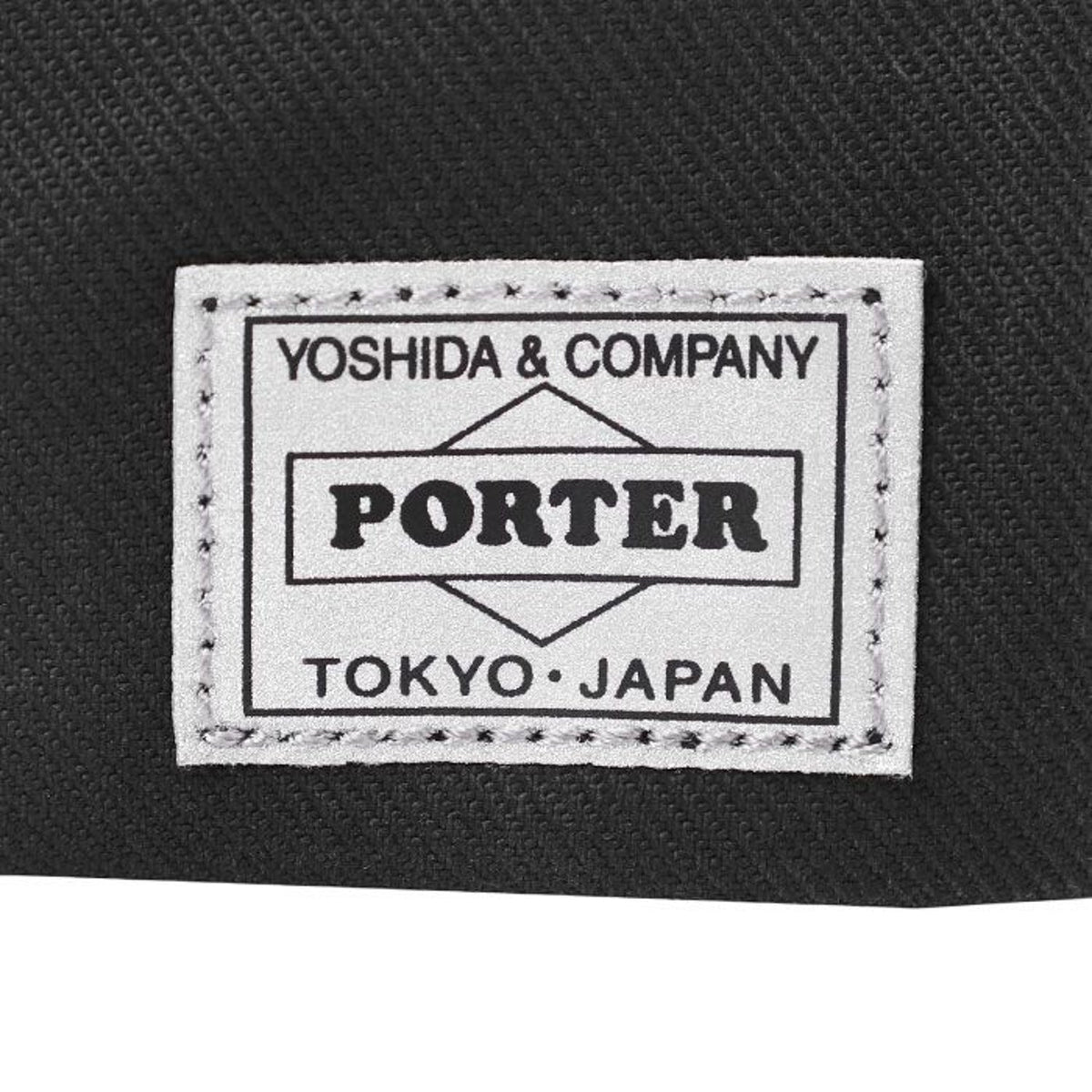 Porter Yoshida Japan Switch shoulder bag in durable fabric with adjustable strap and multiple compartments.
