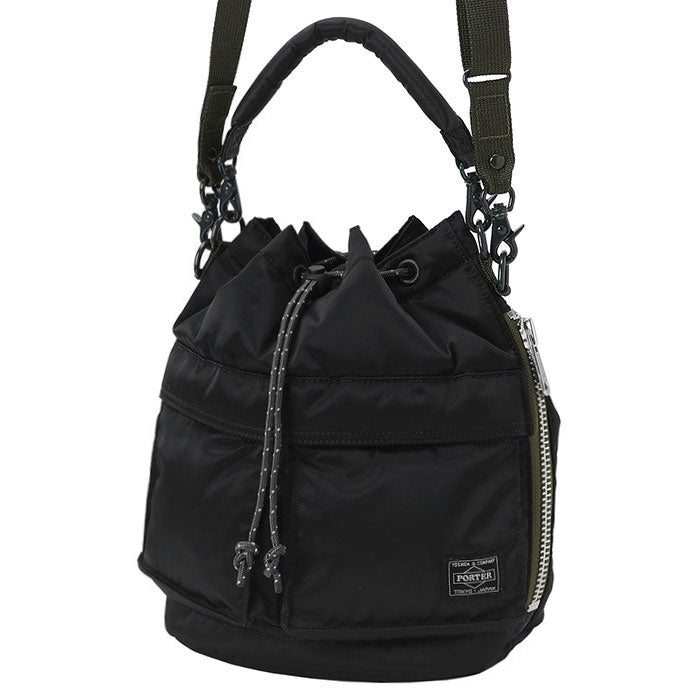 Black Porter Yoshida Japan Tanker 2-Way Tool Bag with multiple compartments and sturdy handles, designed for versatile tool storage.