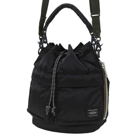 Black Porter Yoshida Japan Tanker 2-Way Tool Bag with multiple compartments and sturdy handles, designed for versatile tool storage.
