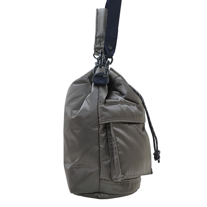 Porter Yoshida Japan Tanker 2-Way Tool Bag in black, durable fabric with multiple compartments and carry handles, versatile for tools.